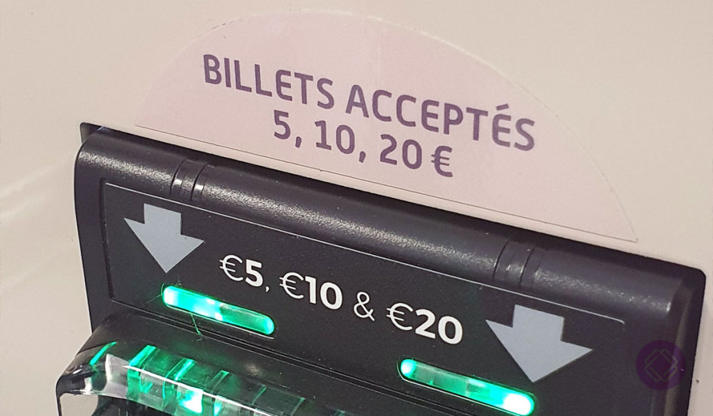 Étiquette adhésive sur automate à billet